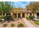 Charming townhome with a landscaped front yard, covered entrance, and inviting curb appeal at 3088 Bicentennial Pkwy, Henderson, NV 89044