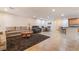 Open-concept living area with tile flooring, recessed lighting, and a seamless flow to the kitchen at 3088 Bicentennial Pkwy, Henderson, NV 89044
