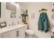 Well-lit bathroom featuring a single sink vanity and decorative fixtures at 3257 River Glorious Ln, Las Vegas, NV 89135