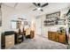 Bedroom featuring desk space, shelving and neutral paint and carpet at 3257 River Glorious Ln, Las Vegas, NV 89135