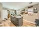 Bright kitchen with a spacious island and hardwood floors at 3257 River Glorious Ln, Las Vegas, NV 89135