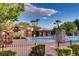 Community pool area featuring water slides, cabanas, and ample seating at 3257 River Glorious Ln, Las Vegas, NV 89135