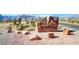 Scenic view of Red Rock Canyon sign against a desert landscape with mountains in the distance at 3257 River Glorious Ln, Las Vegas, NV 89135