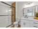 Modern bathroom featuring vanity with white cabinets, walk-in shower and chrome fixtures at 3318 N Decatur Blvd # 1043, Las Vegas, NV 89130