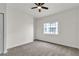 Bedroom with ceiling fan, neutral carpet, and window at 3318 N Decatur Blvd # 1043, Las Vegas, NV 89130