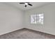 Bedroom with ceiling fan, neutral carpet, and window at 3318 N Decatur Blvd # 1043, Las Vegas, NV 89130