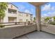 Outdoor patio area with a view of the two-story condo units at 3318 N Decatur Blvd # 1043, Las Vegas, NV 89130