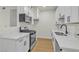Modern kitchen featuring white cabinets, stainless steel appliances, and beautiful countertops at 3318 N Decatur Blvd # 1043, Las Vegas, NV 89130