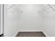 Walk-in closet featuring neutral carpet and wire shelving at 3318 N Decatur Blvd # 1043, Las Vegas, NV 89130
