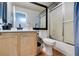 Bathroom featuring a toilet, shower, and sink with lots of counter space at 3432 Beca Faith Dr, North Las Vegas, NV 89032
