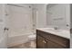 Bathroom with a bathtub and shower combo and a single sink vanity at 345 Gracious Way, Henderson, NV 89011