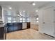 Stylish kitchen with stainless steel dishwasher, granite countertop, and tile flooring at 345 Gracious Way, Henderson, NV 89011