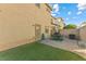 Backyard with patio and artificial grass, great for relaxation at 3532 Carisbrook Dr, North Las Vegas, NV 89081