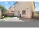 Private backyard with patio, artificial grass, perfect for outdoor entertaining at 3532 Carisbrook Dr, North Las Vegas, NV 89081