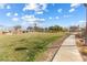 Community park showcasing sidewalk, grassy area, trees, and gazebo at 3532 Carisbrook Dr, North Las Vegas, NV 89081