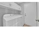 The laundry room features a modern washer and dryer at 3592 N Campbell Rd, Las Vegas, NV 89129