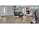 Inviting living room with a fireplace, vaulted ceilings, and ample natural light at 3592 N Campbell Rd, Las Vegas, NV 89129