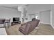 Spacious living room with modern furnishings, neutral tones, and an open layout at 3592 N Campbell Rd, Las Vegas, NV 89129