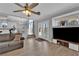 This large living room connects to the patio and features a view of the pool at 3592 N Campbell Rd, Las Vegas, NV 89129