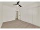 Spacious bedroom with updated flooring, large closets, and a modern ceiling fan at 3667 Mckinley Ave, Las Vegas, NV 89121