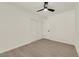 Bedroom with updated flooring, a ceiling fan, and closet with sliding doors at 3667 Mckinley Ave, Las Vegas, NV 89121