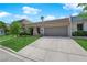 Pleasant single-story residence showcasing a well-kept lawn, lovely landscaping, and an attached garage at 3667 Mckinley Ave, Las Vegas, NV 89121