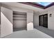 Exterior storage area with shelving and easy access to outdoor living space at 3667 Mckinley Ave, Las Vegas, NV 89121