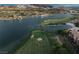 Aerial view of a lakeside golf course with lush green fairways at 38 Costa Tropical Dr, Henderson, NV 89011