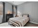 Cozy bedroom featuring a comfortable bed, neutral decor, and natural light from the window, creating a relaxing atmosphere at 38 Costa Tropical Dr, Henderson, NV 89011