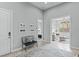 Inviting entryway with neutral tones, tile flooring, and a decorative bench, creating a warm and welcoming first impression at 38 Costa Tropical Dr, Henderson, NV 89011