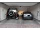 Spacious garage featuring a Tesla charger and room for two cars at 38 Costa Tropical Dr, Henderson, NV 89011
