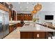 Modern kitchen with an oversized island, stainless steel appliances, and open floor plan at 38 Costa Tropical Dr, Henderson, NV 89011