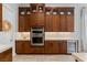 Gourmet kitchen with custom cabinets, built-in appliances, and a large center island at 38 Costa Tropical Dr, Henderson, NV 89011