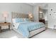 Bright main bedroom with an ensuite bathroom and plush carpet flooring at 38 Costa Tropical Dr, Henderson, NV 89011