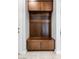 Functional mudroom featuring built-in storage with hooks, cabinets, and a bench, offering practical organization at 38 Costa Tropical Dr, Henderson, NV 89011