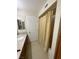 Bathroom with a neutral color scheme, granite countertops, and a shower with tan shower curtain at 390 Rushing Creek Ct, Henderson, NV 89014
