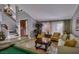 Inviting living room featuring a billiard table, high ceilings and ample seating at 390 Rushing Creek Ct, Henderson, NV 89014