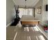Large, bright recreation room with tile flooring and a pool table covered by a cloth at 390 Rushing Creek Ct, Henderson, NV 89014