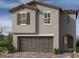 Charming two-story home with tile roof, gray stucco, and attached two car garage at 4208 Mount Bonnell Ave, North Las Vegas, NV 89081