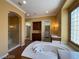 This primary bathroom has tub, walk-in shower, and walk-in closet at 4565 Riva De Romanza St, Las Vegas, NV 89135