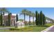 Landscaped entrance to the Siena community with palm trees and manicured greenery at 4565 Riva De Romanza St, Las Vegas, NV 89135