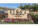 Entrance sign for the Siena Golf Club & Bistro surrounded by colorful flowers at 4565 Riva De Romanza St, Las Vegas, NV 89135