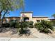 Charming single-story home with desert landscaping and a secure gated entry at 4565 Riva De Romanza St, Las Vegas, NV 89135