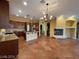 Open kitchen with granite countertops, stainless steel appliances, and center island at 4565 Riva De Romanza St, Las Vegas, NV 89135