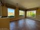 This living room offers views of the desert landscape at 4565 Riva De Romanza St, Las Vegas, NV 89135