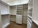 Organized walk-in closet with ample shelving and hanging space at 4565 Riva De Romanza St, Las Vegas, NV 89135