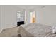 Neutral bedroom showcases a comfortable bed and window for natural light at 5055 W Hacienda Ave # 1136, Las Vegas, NV 89118