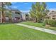Well-maintained building with green grass, showcasing its exterior appeal at 5055 W Hacienda Ave # 1136, Las Vegas, NV 89118