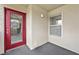 Enclosed patio space with a red door and a window, perfect for relaxing at 5055 W Hacienda Ave # 1136, Las Vegas, NV 89118
