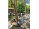 Cozy backyard patio area with decorative statues and a bench at 5305 Bright Sun Ct, Las Vegas, NV 89130